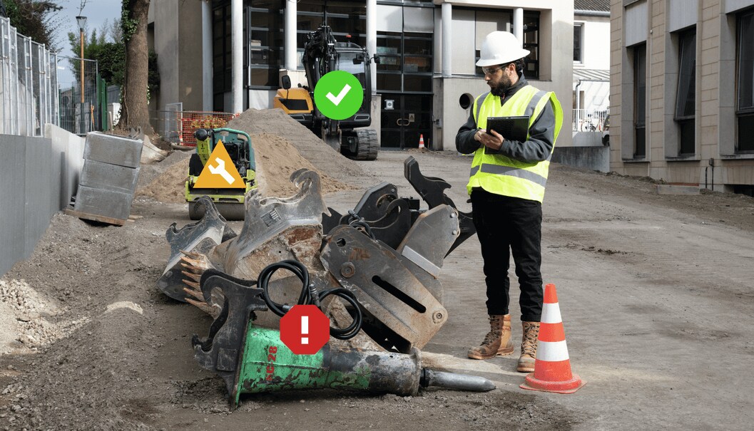 Ein Arbeiter überprüft Baumaschinen auf der Baustelle.