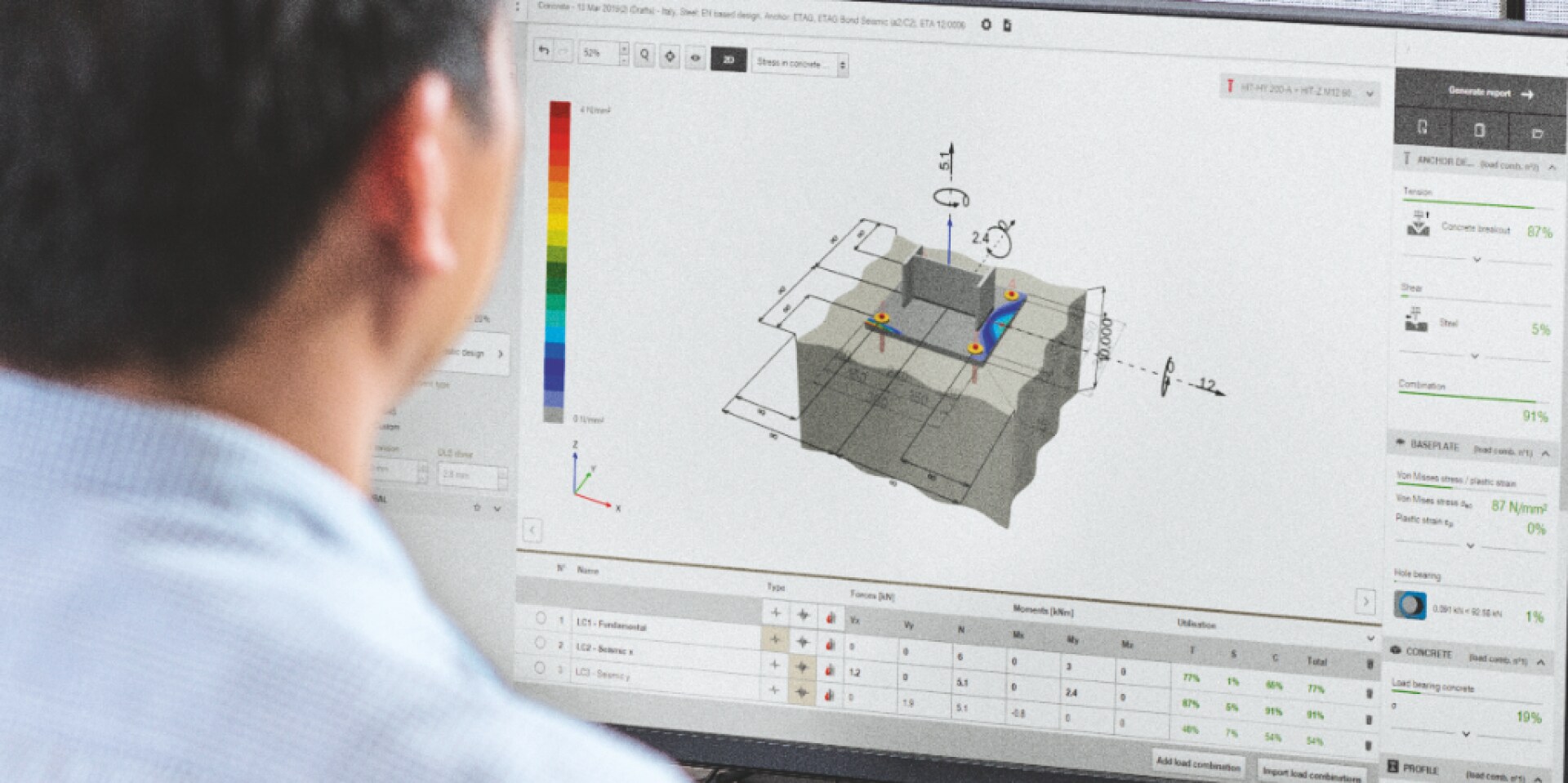 Mann konstruiert Grundplatte mit PROFIS Engineering Suite auf einem Desktop