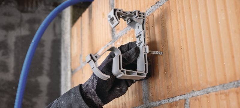 Kabelhalter X-ECH MX (02) Kunststoff-Sammelhalter, optimiert für magazinierte Nägel und kompatibel mit einer Vielzahl von Befestigungsmethoden und Untergrundmaterialien Anwendungen 1