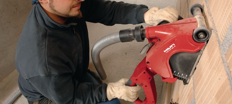 Bild 2 von 3: Schlitzgerät DCH 180-SL Handgeführtes Elektro-Schlitzgerät für Trockenschnitte, leistet bei Parallelschnitten bis zu 60 mm Schnitttiefe Anwendungen 1